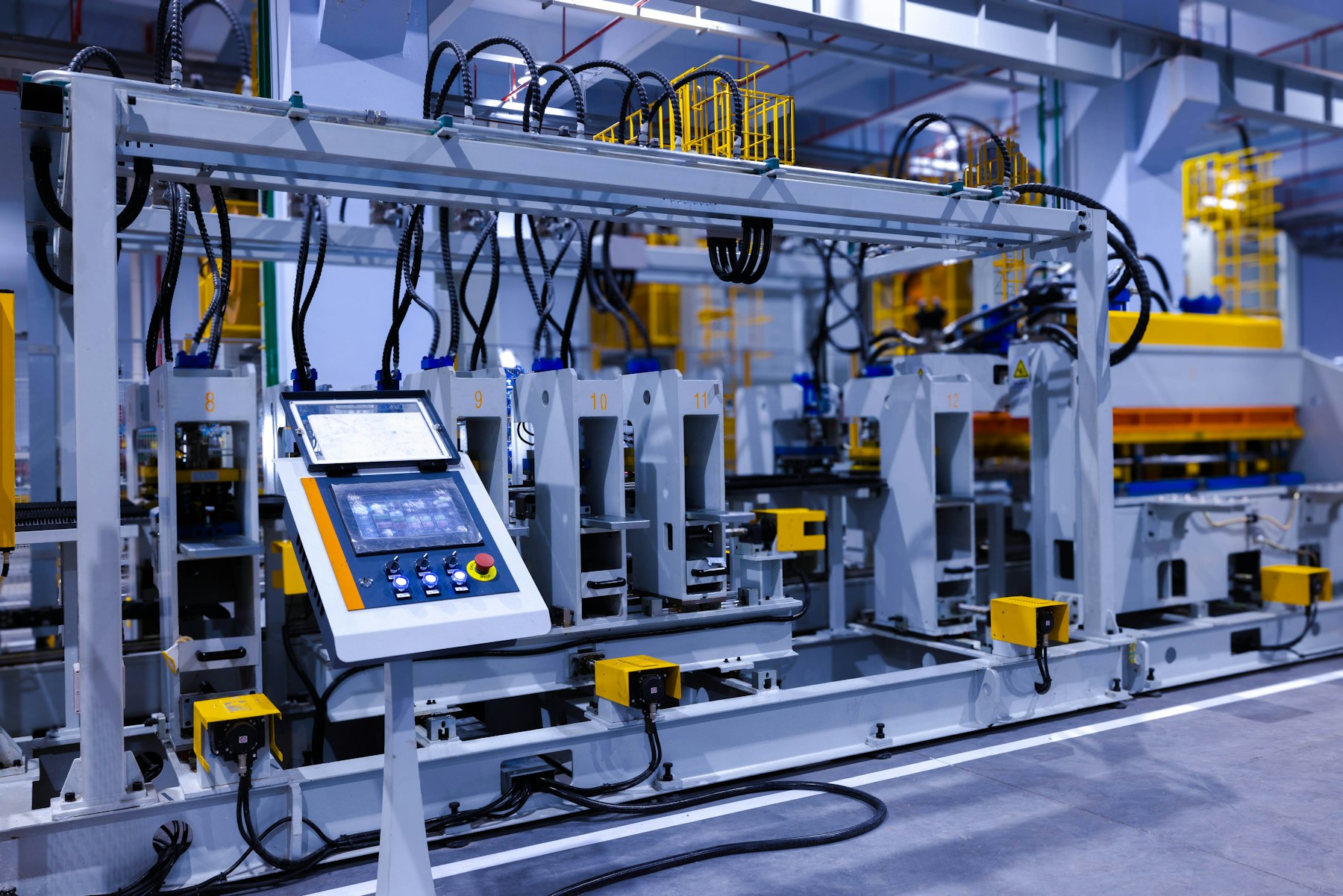 Touchscreen control panel and connected equipment on a modern manufacturing line